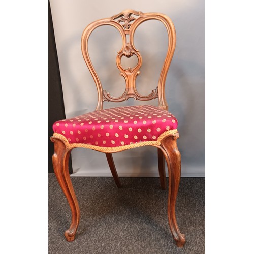 393 - Three Victorian bedroom chairs all with matching upholstery and raised on cabriole legs [98cm high]