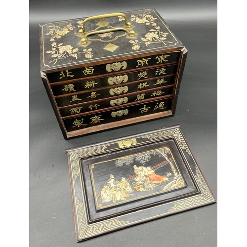 138 - Antique Chinese Mahjong game fitted within an ornate carry case, each panel depicting various figura... 