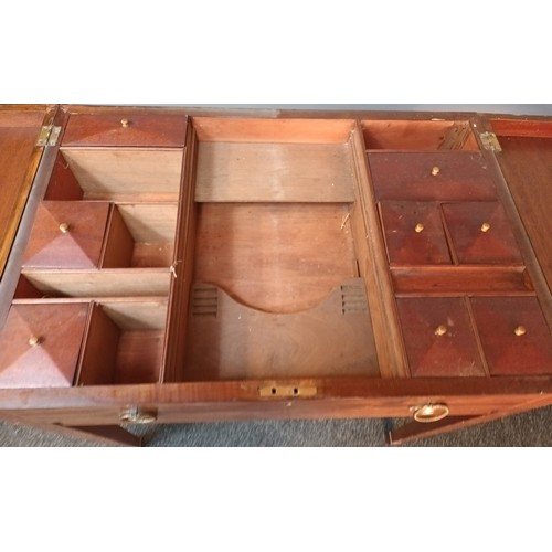 372 - 19th century dressing table, the top opening to interior storage compartments, above a dummy drawer,... 