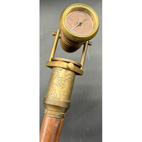 212 - Reproduction Dollond London walking cane fitted with a brass handle, fitted with a compass and swive... 