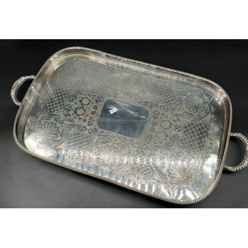 213 - A Large two handle Sheffield silver plate serving tray.