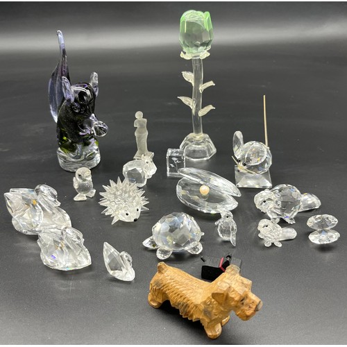 222 - A Quantity of crystal and art glass animals to include various Swarovski crystal figures.