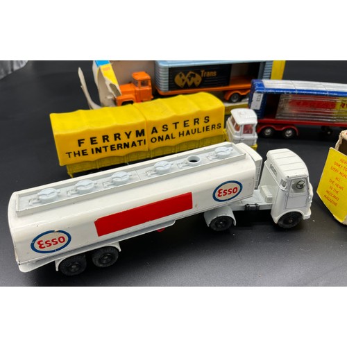 231 - A Selection of four various Corgi and dinky lorry models to include Dinky ESSO A.E.C. Fuel Tanker No... 