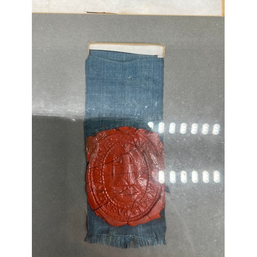 280 - 17th century document written on pig skin, Together with a framed hand written document with seal at... 