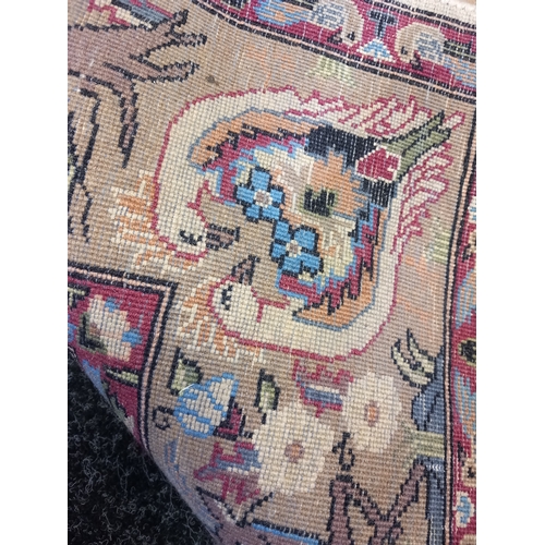 402 - A Quality Asian Wool Rug depicting a wood scene with exotic birds and animals. L 230 X w 138