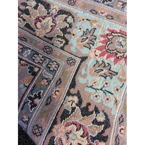 403 - A Wool Rug with Floral design. L 270 X W 148