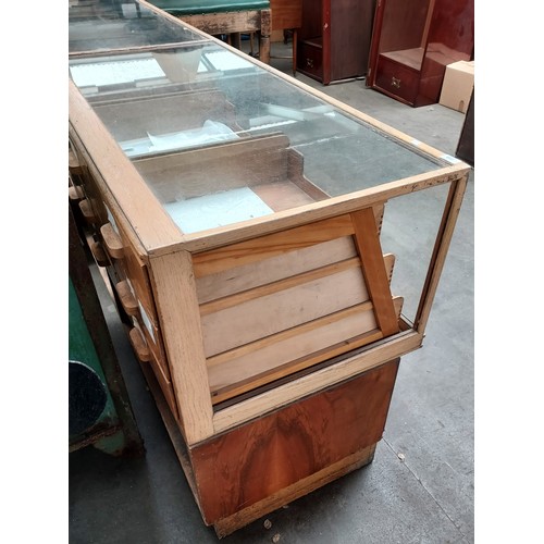 376 - Retro haberdashery shop counter, glazed top and sides above banks of drawers and underneath interior... 