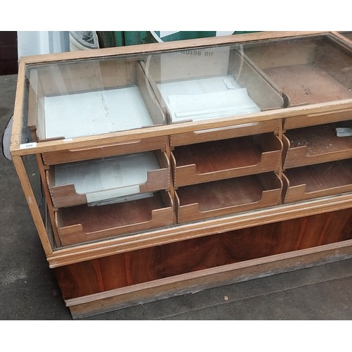 376 - Retro haberdashery shop counter, glazed top and sides above banks of drawers and underneath interior... 