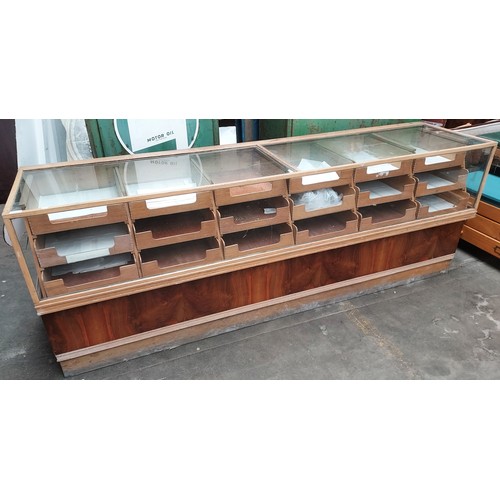 376 - Retro haberdashery shop counter, glazed top and sides above banks of drawers and underneath interior... 