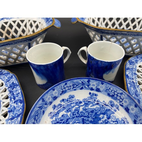 283 - A Collection of Pealware blue and white wares, includes pierced baskets and dishes, cups and saucers... 