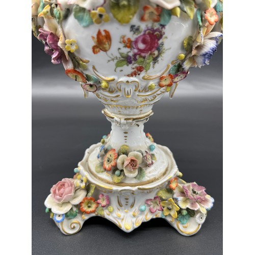 285 - Antique Royal Vienna mantel piece urn with lid. Highly decorated with raised relief flowers, Lid has... 