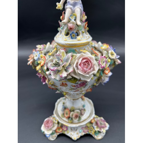 285 - Antique Royal Vienna mantel piece urn with lid. Highly decorated with raised relief flowers, Lid has... 