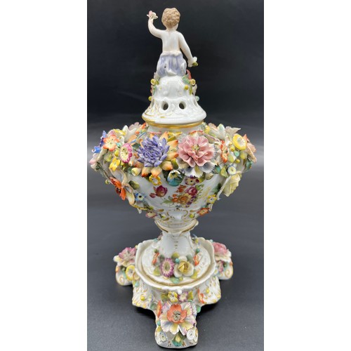 285 - Antique Royal Vienna mantel piece urn with lid. Highly decorated with raised relief flowers, Lid has... 