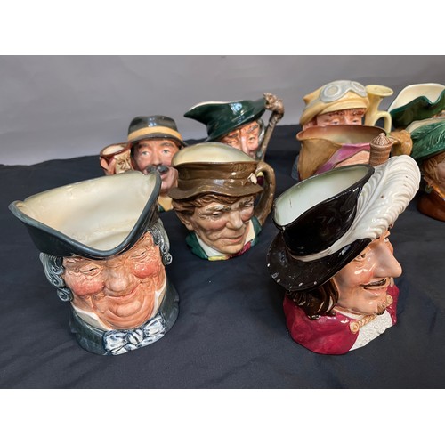 438 - A Lot of 10 Royal Doulton large character toby jugs. Includes 'The McCallum, Arriet, Porthos, Parson... 