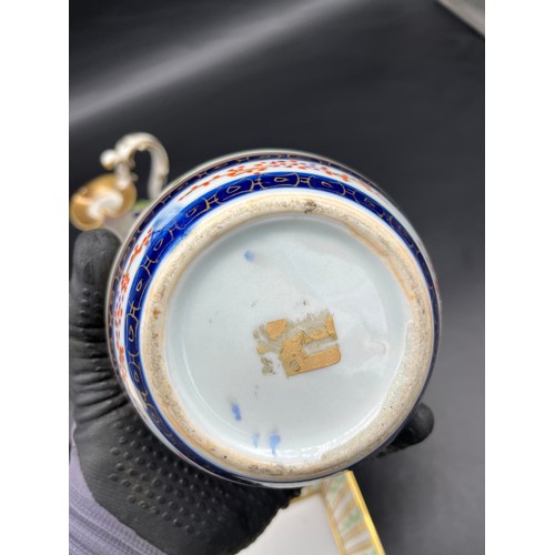 413 - Selection of collectable porcelain to include 19th century Derby two handle cup with raised relief f... 