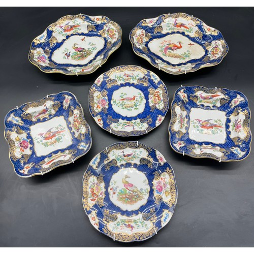 411 - A selection of 19th century Birds of Paradise design wall hanging plates/ cabinet plates and bowls.