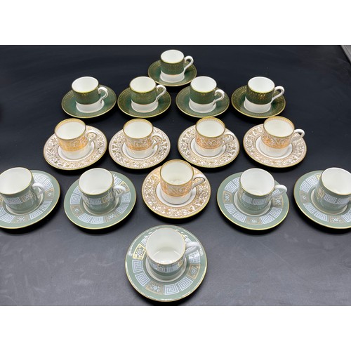 409 - Three lots of 5 coffee cans and saucers, Two sets produced by Wedgwood and the other by Coalport.