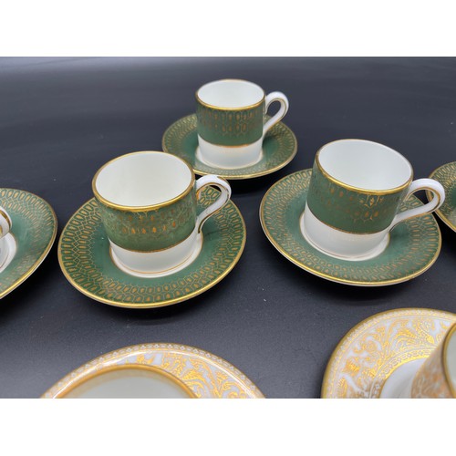 409 - Three lots of 5 coffee cans and saucers, Two sets produced by Wedgwood and the other by Coalport.