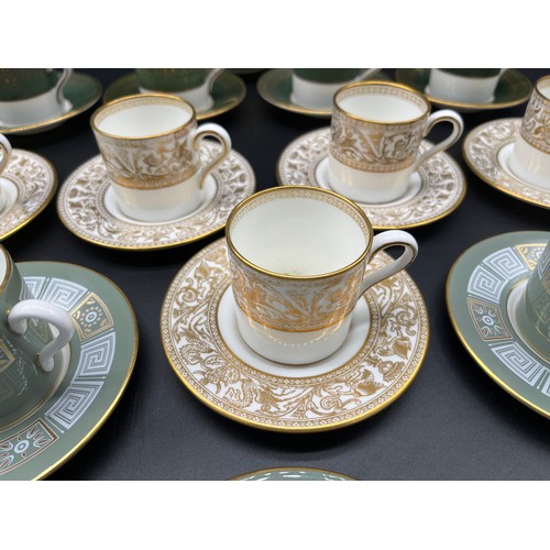 409 - Three lots of 5 coffee cans and saucers, Two sets produced by Wedgwood and the other by Coalport.