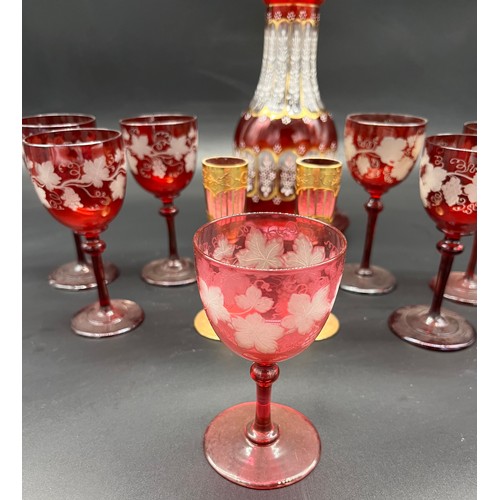 297 - A Lot of 19th century etched ruby glass wine glasses, cranberry etched glass, two ruby and gold pain... 