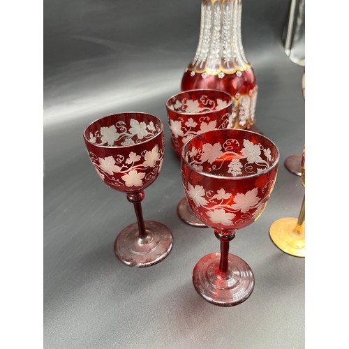 297 - A Lot of 19th century etched ruby glass wine glasses, cranberry etched glass, two ruby and gold pain... 