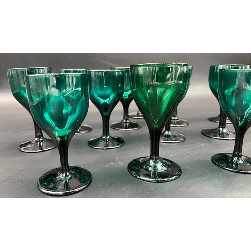 295 - A Collection of Fourteen 19th century English 'Bristol Green' wine glasses.