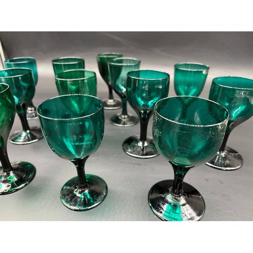 295 - A Collection of Fourteen 19th century English 'Bristol Green' wine glasses.