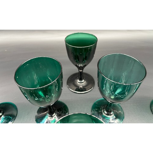 295 - A Collection of Fourteen 19th century English 'Bristol Green' wine glasses.