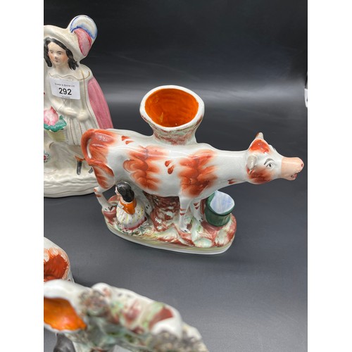 292 - A Collection of 19th century Staffordshire flatback figures. Includes creamer.