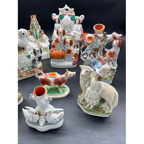 292 - A Collection of 19th century Staffordshire flatback figures. Includes creamer.