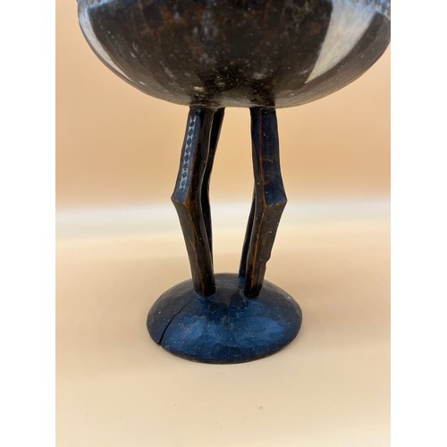 193 - Antique tribal African decorated pedestal bowl. Made from one piece of wood. [26cm high, 22.5cm in d... 