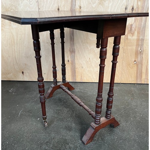 199 - Antique Mahogany Sutherland drop end table. Turned leg supports. [One leg damaged- see images] [62x7... 