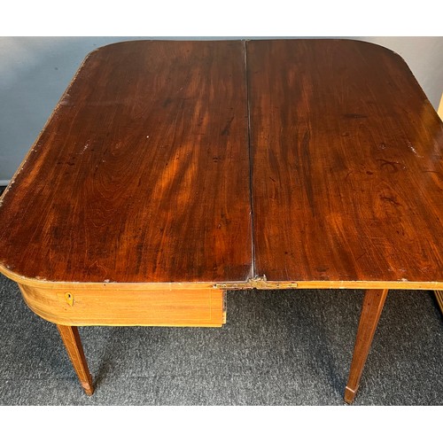 196A - 19th century mahogany flip top table, the D-shaped top opening to a larger surface area, above an in... 