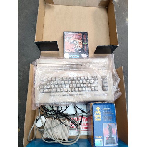 227 - Commodore console with accessories etc .