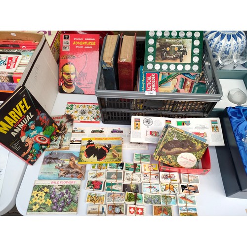 226 - Box of vintage cigarette albums , cards , coin set , vintage comics and books to include marvel comi... 