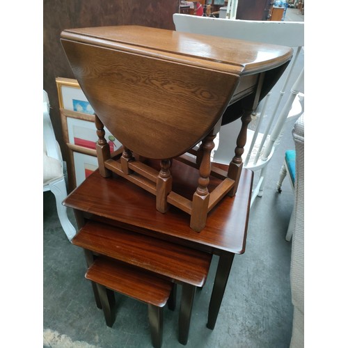 218 - Mahogany nest of table s together with small drop leaf table