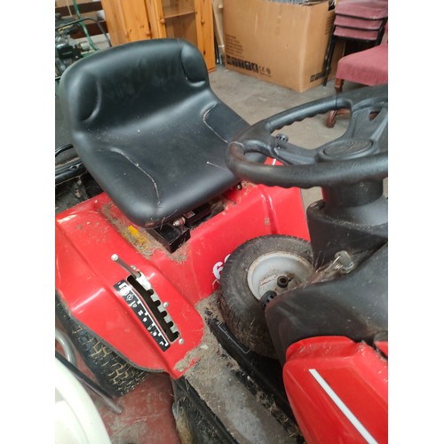 210 - Lawn flite sit on petrol tractor lawn mower