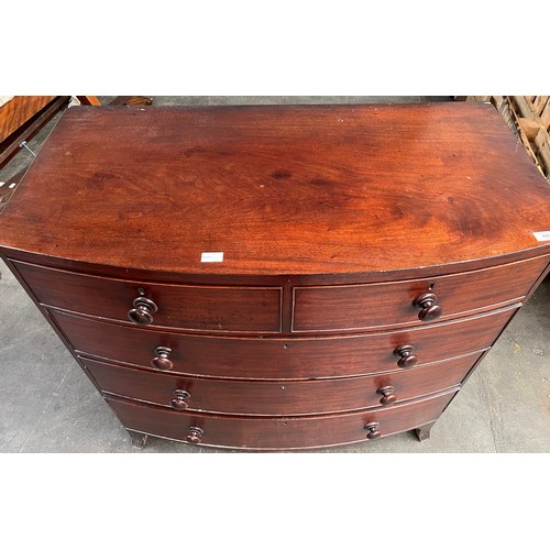 247 - 19th century Georgian bow front chest of drawers, Consists of Two small drawers over the large drawe... 