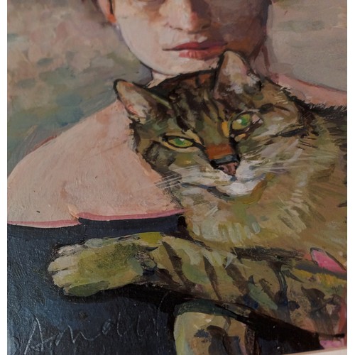 257 - Framed oil depicting a lady holding a cat, signed to the corner by the artist. [33x26cm]