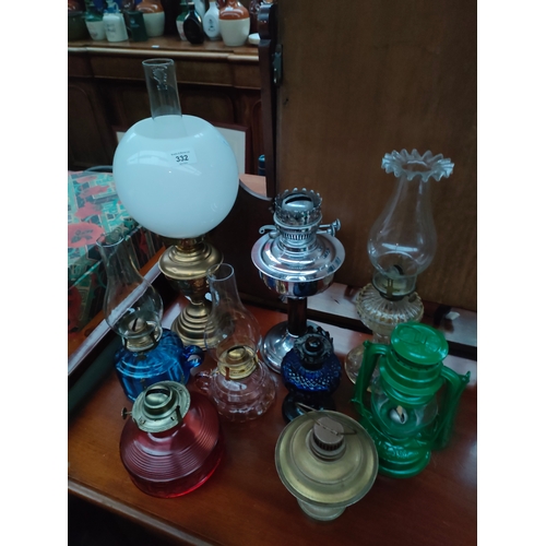 332 - A Collection of various oil lamps