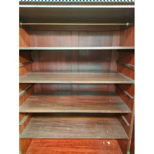 383 - 2 door linen cupboard fitted with shelves