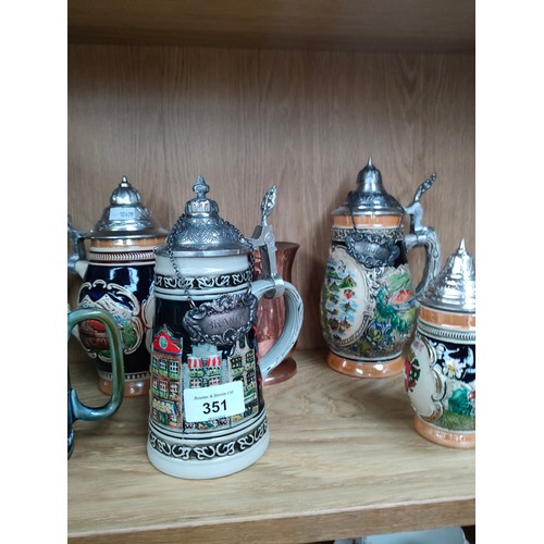 351 - Shelf of German tankards etc