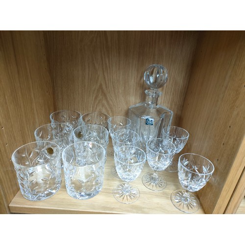 354 - 3 shelves of crystal to include decanters and whisky glasses etc