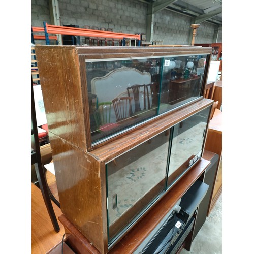 373 - Two section barristers bookcase, glass sliding doors.