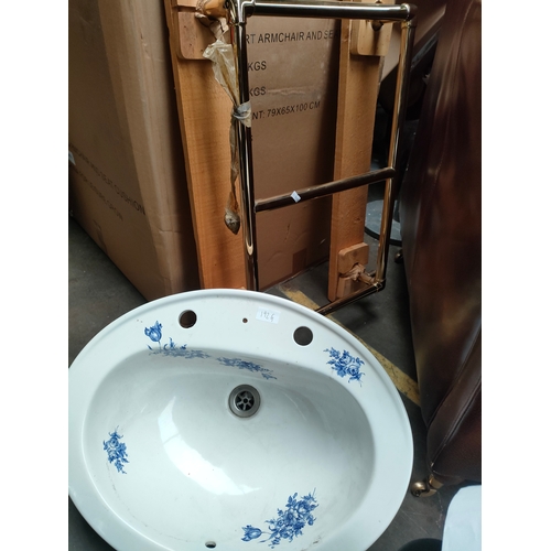 192G - Decorative floral pattern sink along with wall mounted towel rail