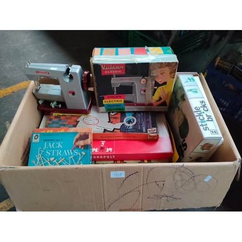 180F - Large box of vintage games together with Vulcan sewing machine etc