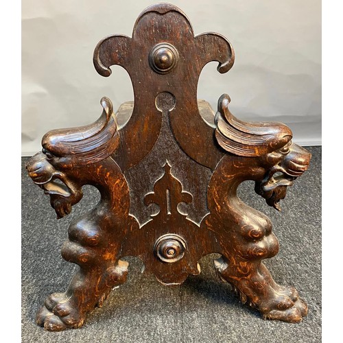 783 - 19th century small bench/ foot stool. Designed with carved front facing panel depicting lion style h... 