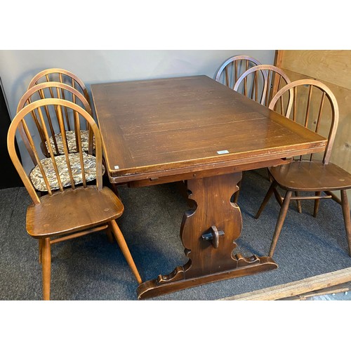 775 - Vintage Ercol dark wood extending dining table with 6 matching Ercol spindle back dining chairs. [Ta... 