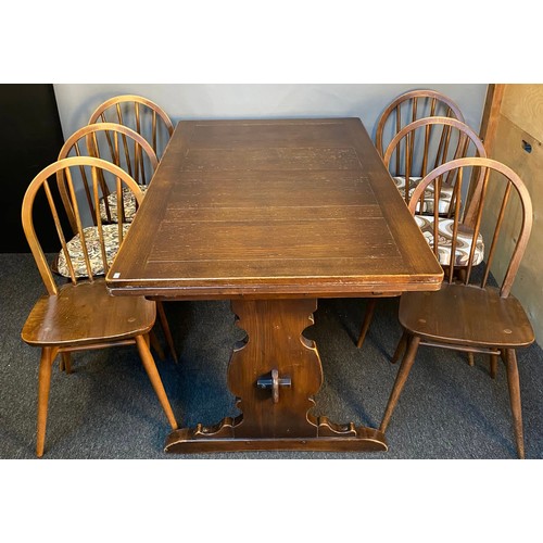 775 - Vintage Ercol dark wood extending dining table with 6 matching Ercol spindle back dining chairs. [Ta... 