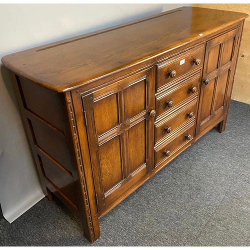 773 - Vintage Ercol sideboard, four drawers and two doors. [90x145x51cm]